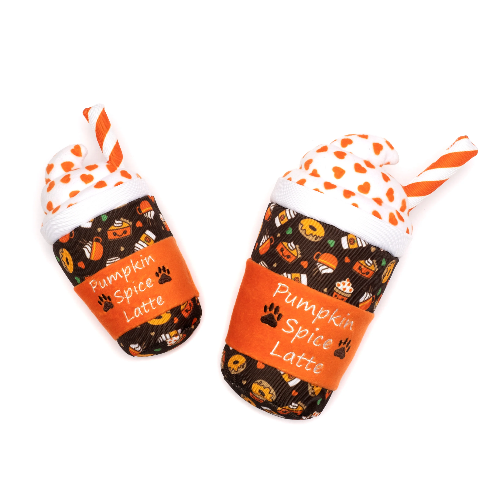 Two plush dog toys shaped like pumpkin spice latte cups on a plain white background. The toys feature a black body with a Halloween-themed pattern of pumpkins, orange text reading 'Pumpkin Spice Latte,' white faux-frosted tops, orange and white striped straws, and white faux-fur details.