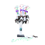 Decorative feathered item with colorful ribbons on a white background