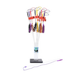Colorful fishing line and lure set on a stand with a white background