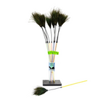 Set of fishing rods with brooms on a stand against a white background