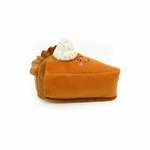 Plush toy shaped like a slice of pie with whipped cream on a white background