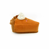 Plush toy shaped like a slice of pie with whipped cream on a white background