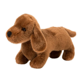 Brown plush dachshund toy on a white background