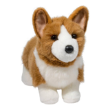 Plush toy corgi dog on a white background
