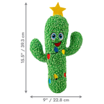 A green cactus-shaped plush toy with a yellow star on top, blue eyes, a red mouth, and multicolored Christmas lights, shown with dimension arrows and labels indicating 15.5 inches tall by 9 inches wide on a white background.