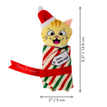 A plush cat toy wrapped in a red, white, and green striped Christmas scarf with a red Santa hat, shown on a white background with dimension arrows indicating 5.5 inches tall by 2 inches wide.