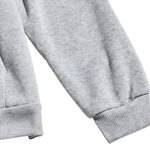 Close-up of a light gray heather sweatshirt sleeve with ribbed cuffs on a white background.