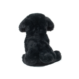 Black plush dog toy on a white background