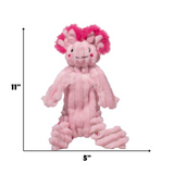 Pink plush toy with measurements on a white background