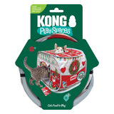 Kong PlaySpaces cat toy in its retail packaging, featuring a red and white Christmas-themed play tent with a cat printed on the packaging, and a gray rolled-up cat toy cable visible behind it.