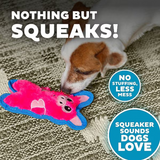 Dog playing with a pink and blue toy on a textured surface, with text highlighting features of the toy.