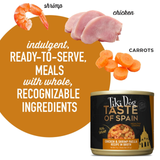 Tiki Dog Taste of Spain pet food can with ingredients like shrimp, chicken, and carrots displayed.