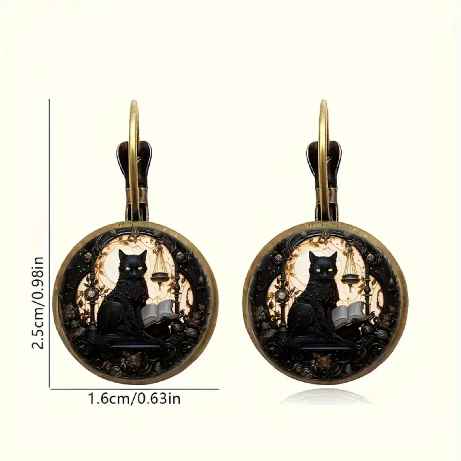 Pair of earrings with black cat design on a white background