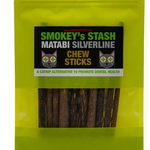 Pack of Smokey's Stash Matabi Silverline Chew Sticks for cats on a green background
