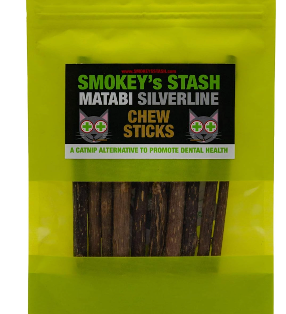 Pack of Smokey's Stash Matabi Silverline Chew Sticks for cats on a green background