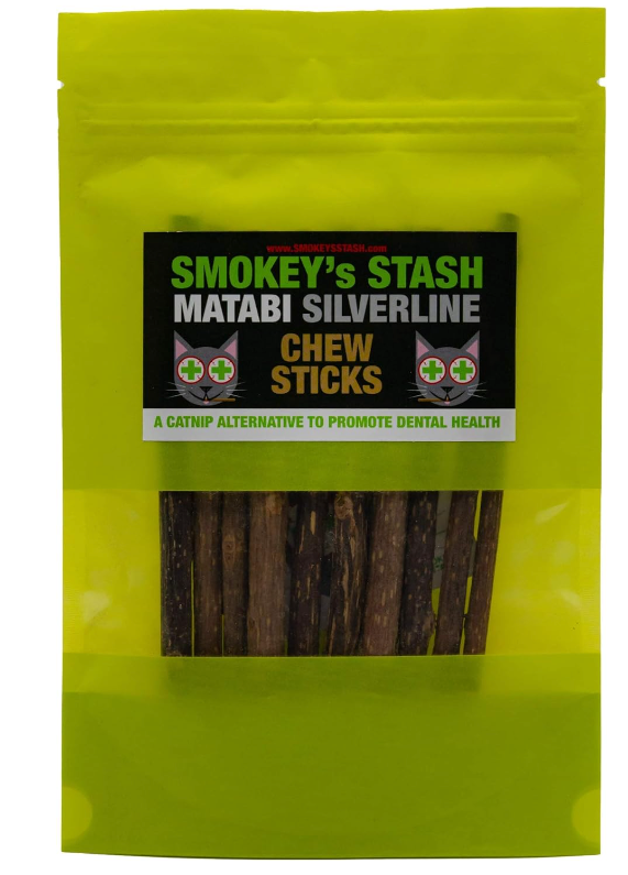 Pack of Smokey's Stash Matabi Silverline Chew Sticks for cats on a green background