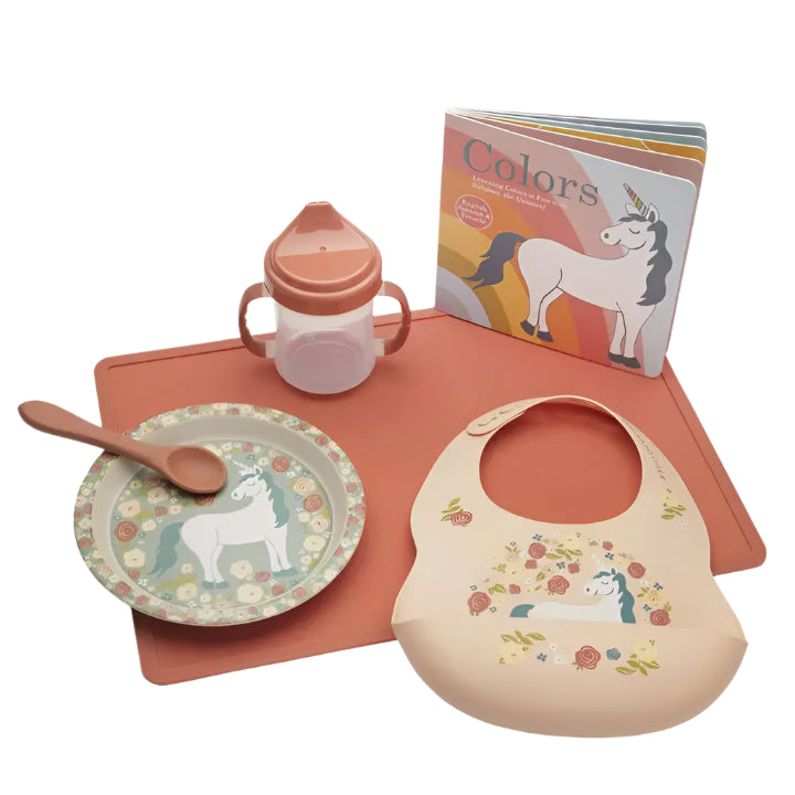 Children's tableware set with unicorn design on a white background