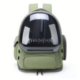 Green pet backpack with a transparent window on a white background