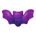 A purple dog lick toy with a ribbed center and embossed 'BARK' logo, shown on a plain white background.