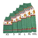 Green dog sweaters with gingerbread design and size labels on a white background
