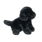 Black plush dog toy on a white background