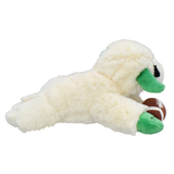 A plush dog toy shaped like a white dog lying down and holding a small brown football, photographed on a plain white background.