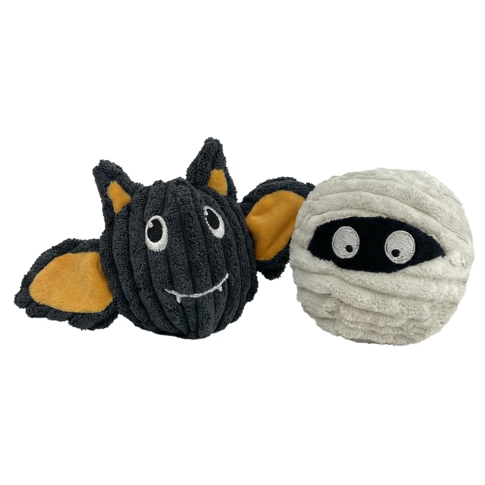 Two Halloween-themed plush dog toys on a white background: a black bat toy with tan ears and a white mummy toy with a black face.