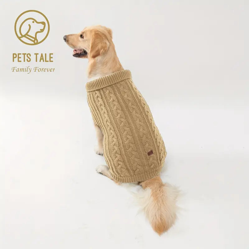 Dog wearing a beige knitted sweater on a white background with 'Pets Tale' branding.