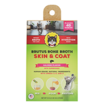 Brutus Bone Broth Skin & Coat salmon flavor cat supplement packaging, featuring a green and yellow design with a cat illustration and product usage icons.