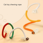 Cat toy chewing rope with colorful ends on a beige background