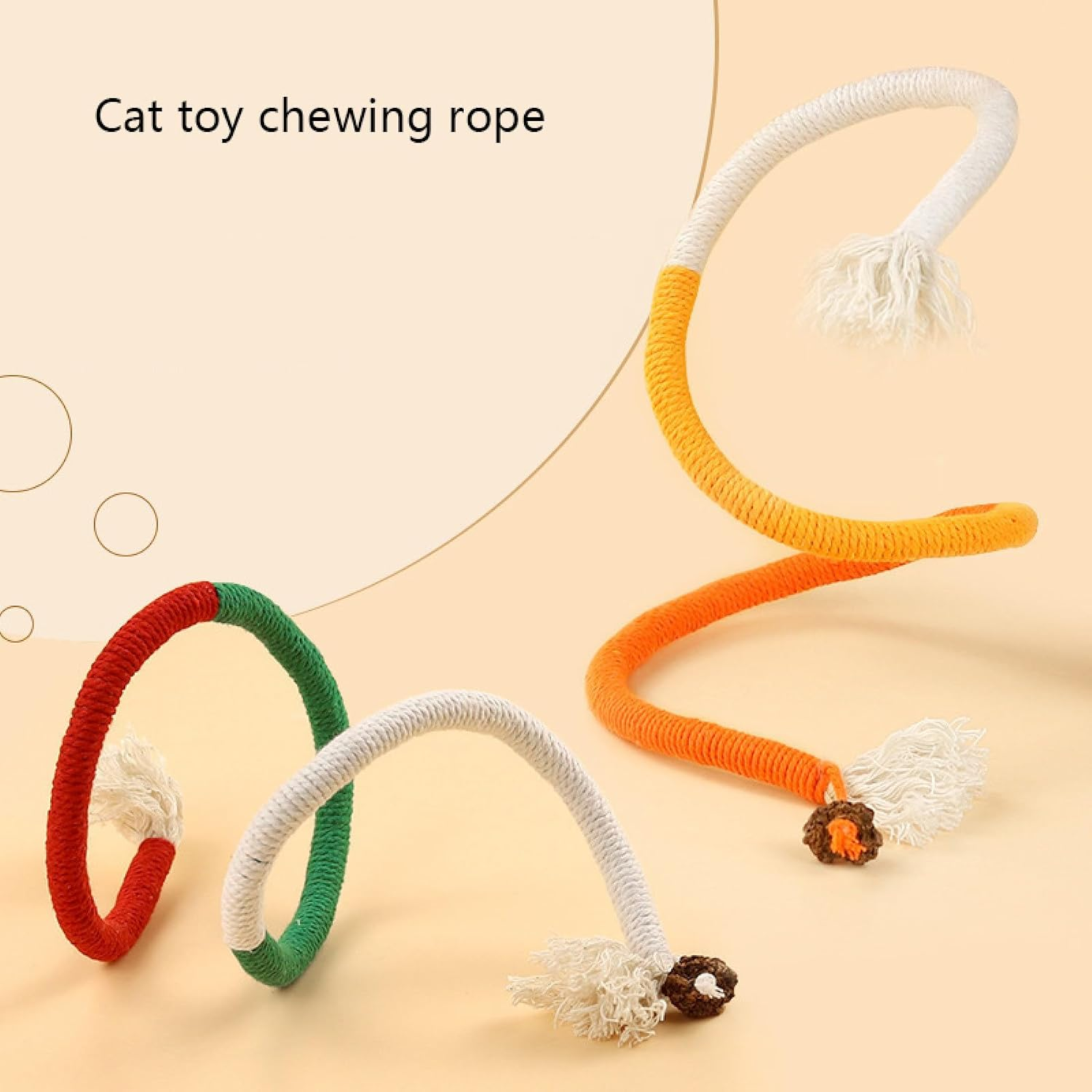 Cat toy chewing rope with colorful ends on a beige background