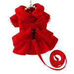 Red pet dress with a large bow and matching leash on a white background