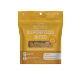 A package of Good Treats Naturals Superfood Bites dog treats, Peanut Butter & Banana flavor, in a golden yellow resealable pouch with a clear window showing the brown treats inside.