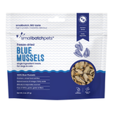 A 2 oz bag of Small Batch Pets freeze-dried Blue Mussels single-ingredient treats for dogs and cats, featuring a white and navy blue package design with a circular window showing the freeze-dried mussels inside.