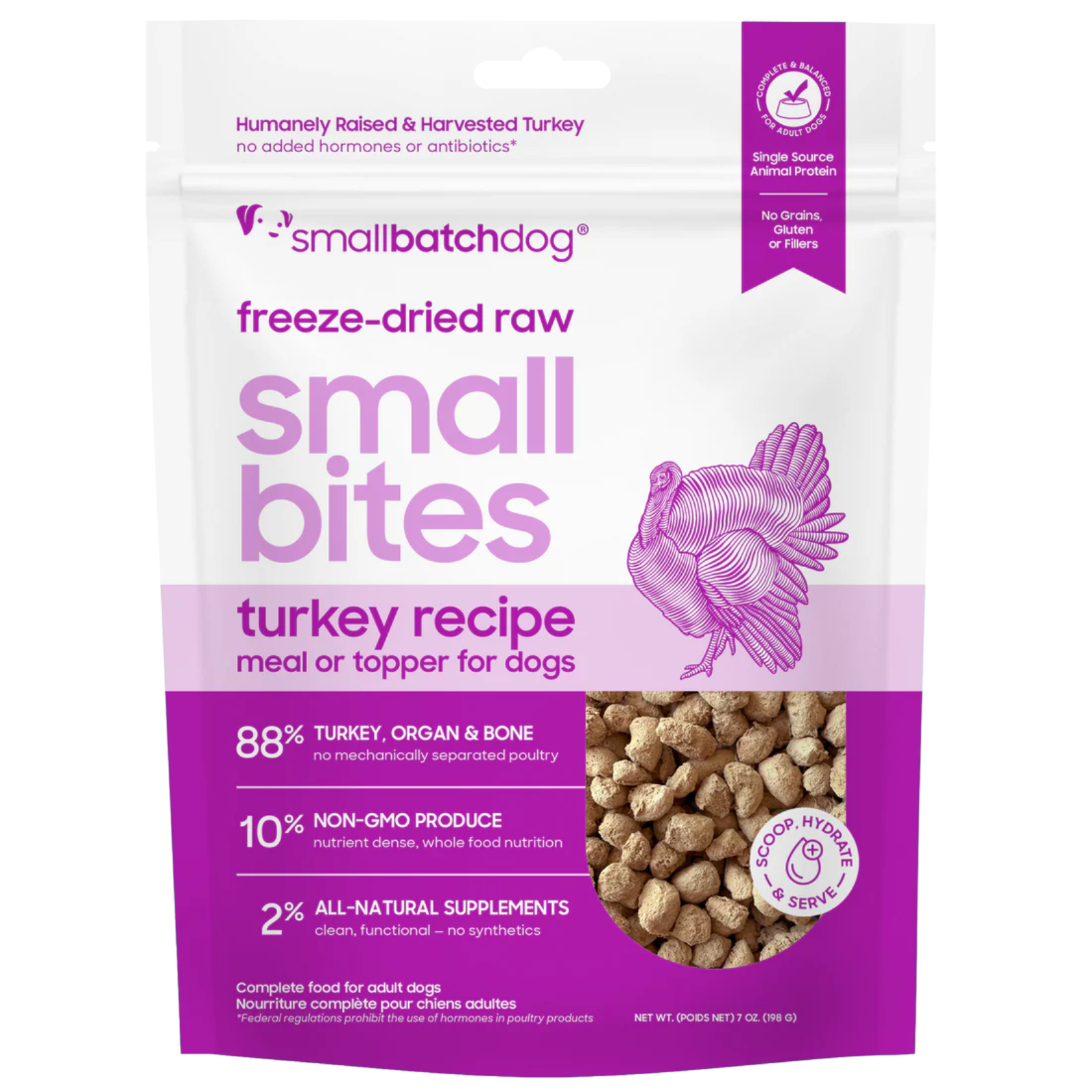 A bag of Small Batch Dog Freeze-Dried Raw Small Bites Turkey Recipe dog food, featuring a white and purple package with a purple turkey illustration and a clear window showing the raw meat pieces inside.