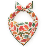 Leaf-patterned bandana with a bow on a white background