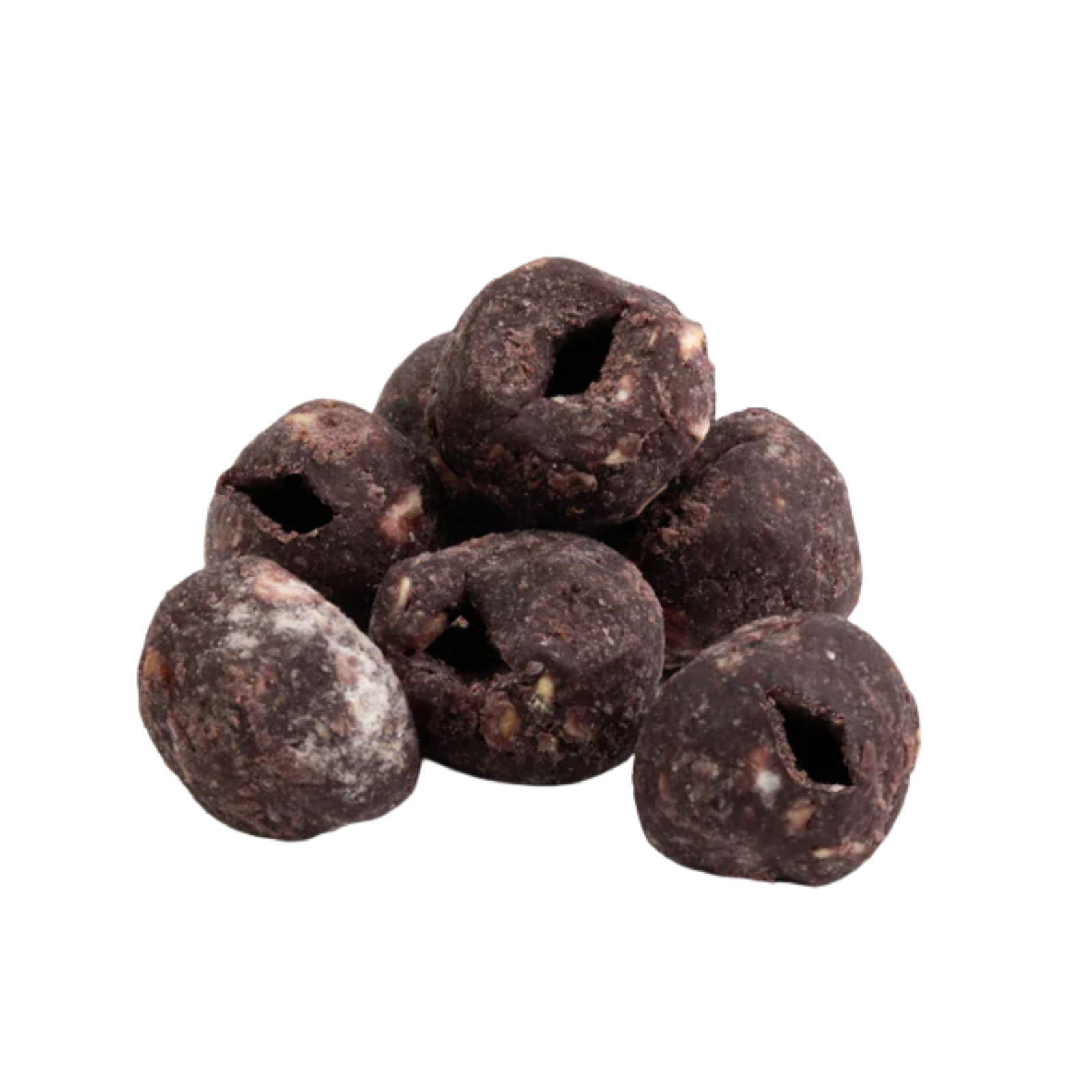Dark brown dried fruits with holes on a white background