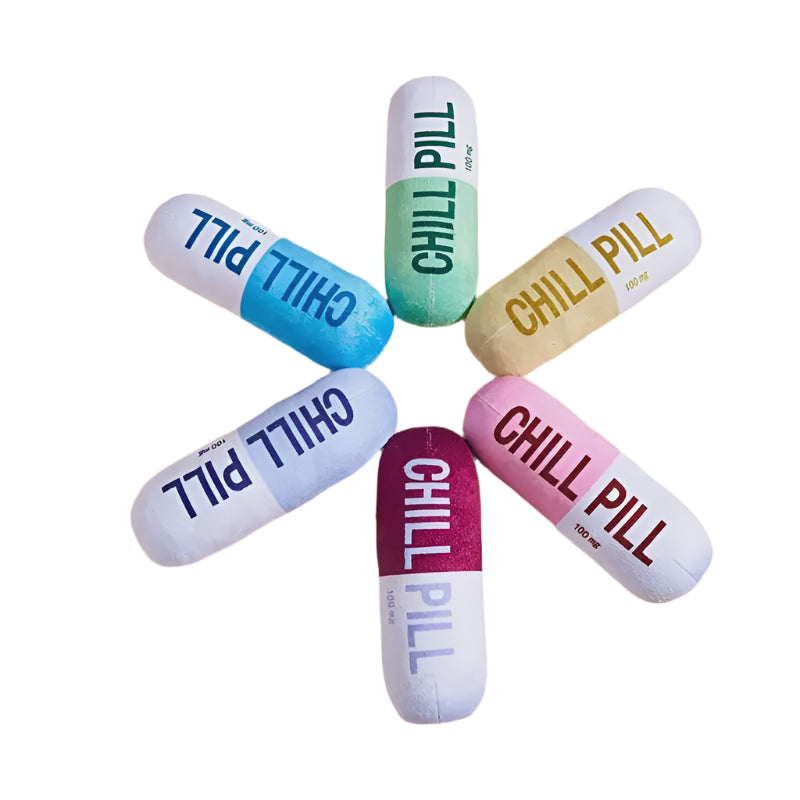 Colorful 'Chill Pill' capsules arranged in a circle on a white background