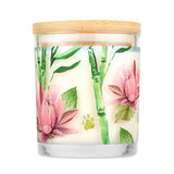 Candle with floral design and wooden lid on a white background