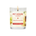 Pet House Candle with a lit wick on a white background