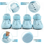Light blue children's shoes with features highlighted on a white background