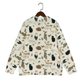 Sweater with animal pattern on a hanger against a white background