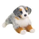 Plush toy dog with gray, white, and brown fur on a white background