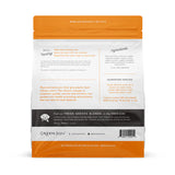 Green Juju pet food packaging with orange and white design on a white background