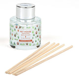 Pet House Freshening Reed Diffuser with wooden sticks on a white background