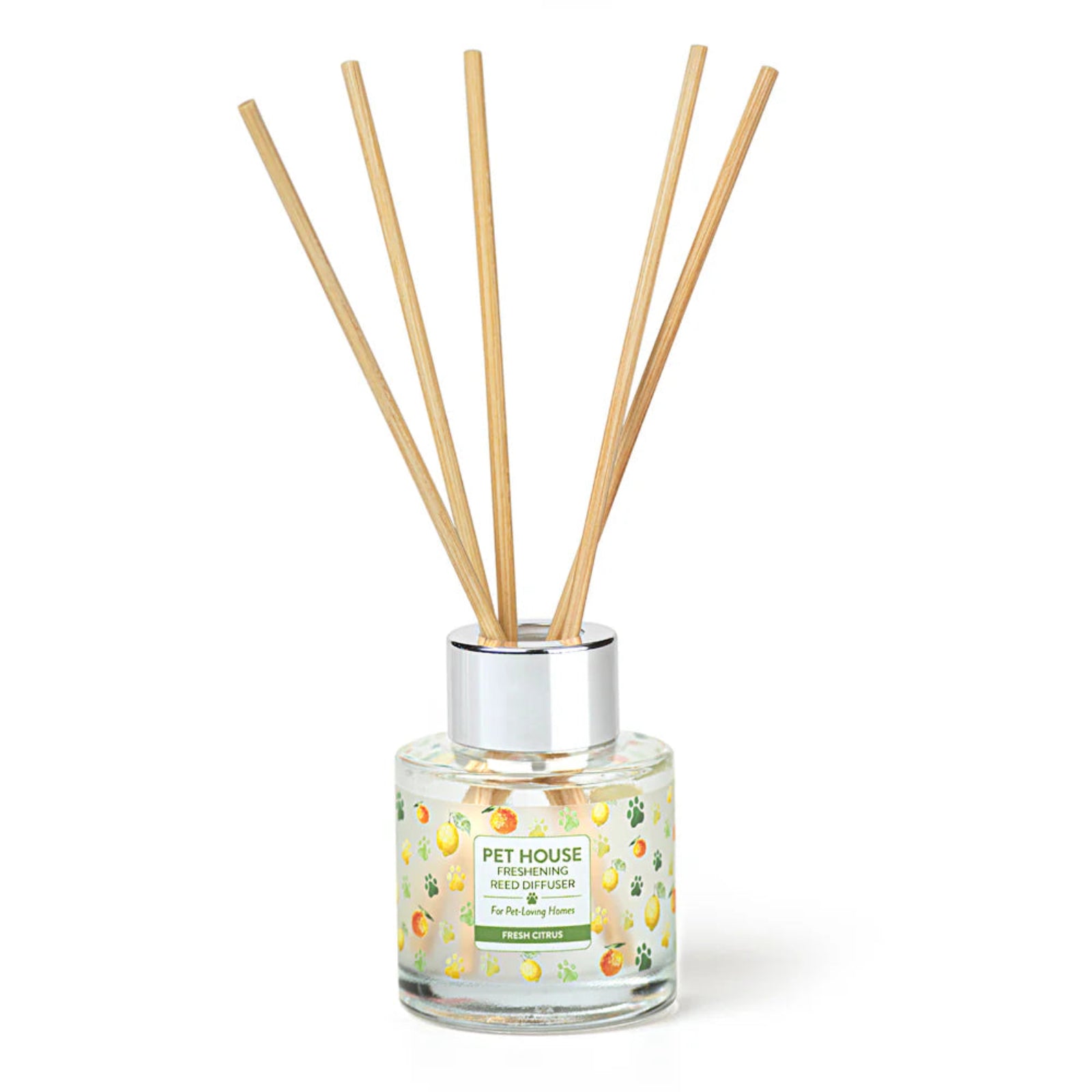 Reed diffuser with wooden sticks in a glass container on a white background