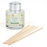 Pet House reed diffuser with wooden sticks on a white background