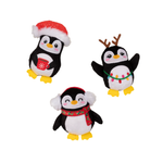 Three Christmas-themed penguin toys on a white background