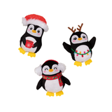 Three Christmas-themed penguin toys on a white background