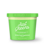 Green container of 'Just Greens' whole food supplement for dogs on a white background